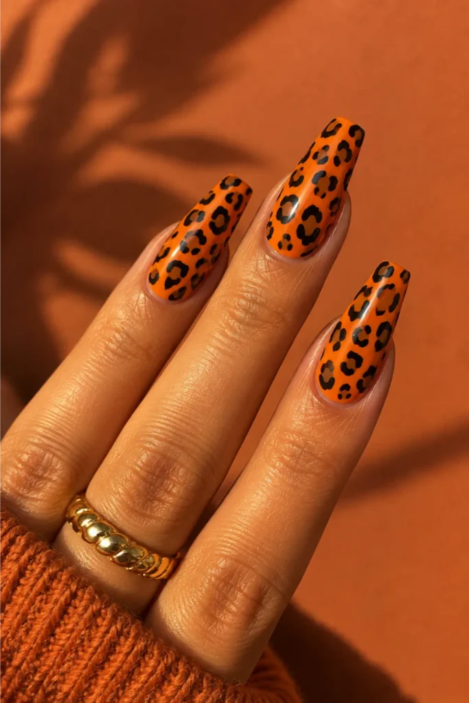 Bold Orange and Black Leopard Print Coffin Nails
