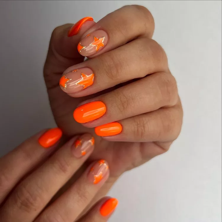 Neon Orange With Hidden Gold Stars Underneath the Color