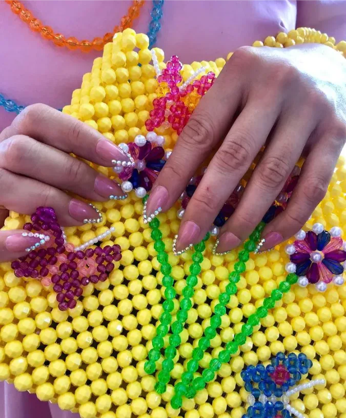 Pearl-Trimmed Mauve Stiletto Nails